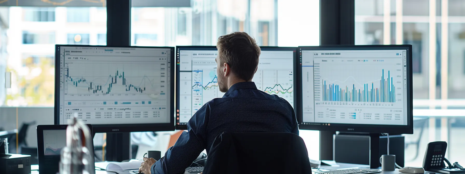 a person analyzing data on a computer screen with charts and graphs in a modern office in melbourne.