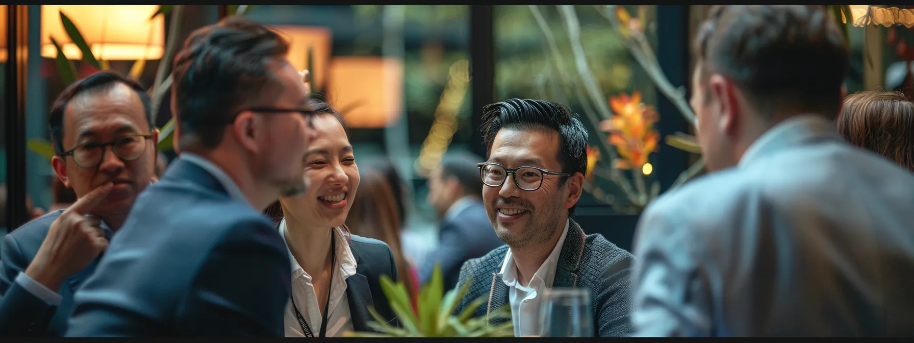 a group of people networking and engaging in discussions at a melbourne event.