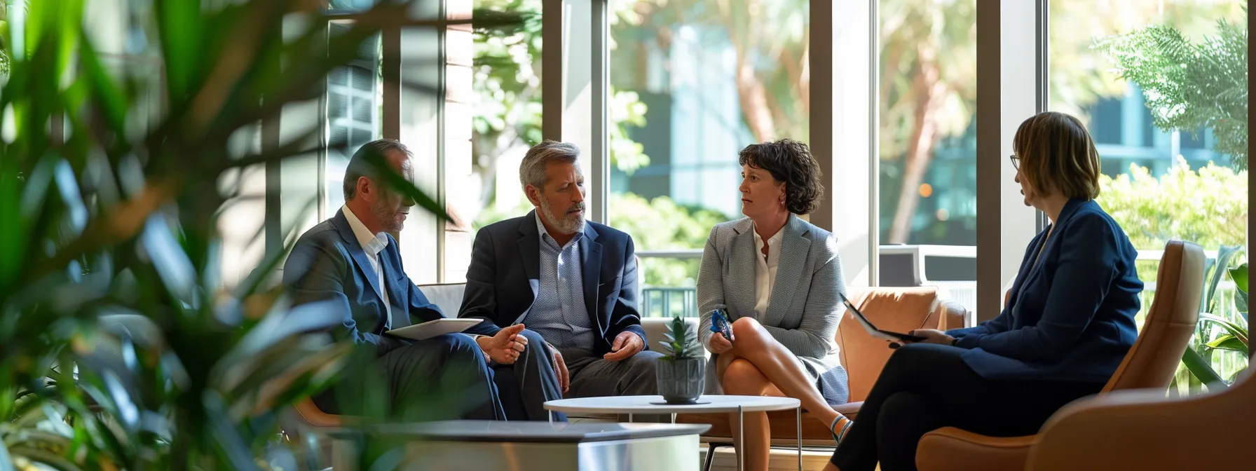 a group of business professionals discussing seo strategies in a modern office in melbourne, fl.