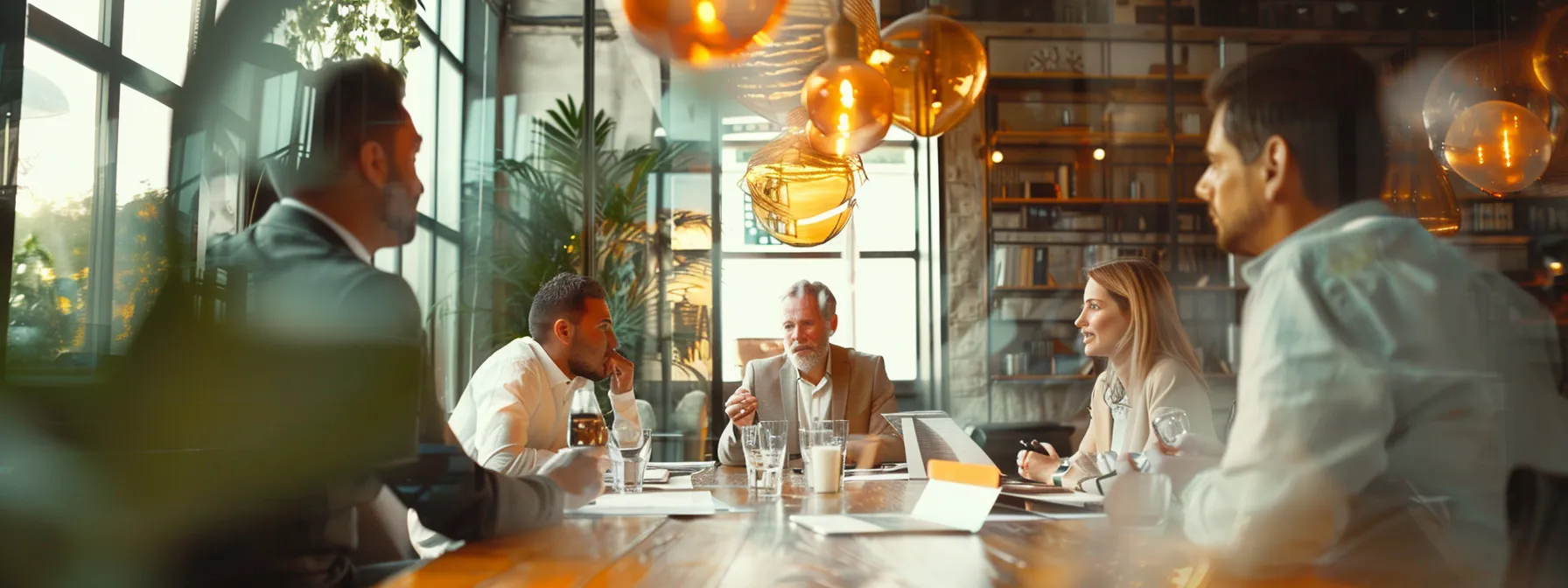 a group of people sitting around a table, discussing feedback surveys and analyzing web analytics for improving conversion rates.